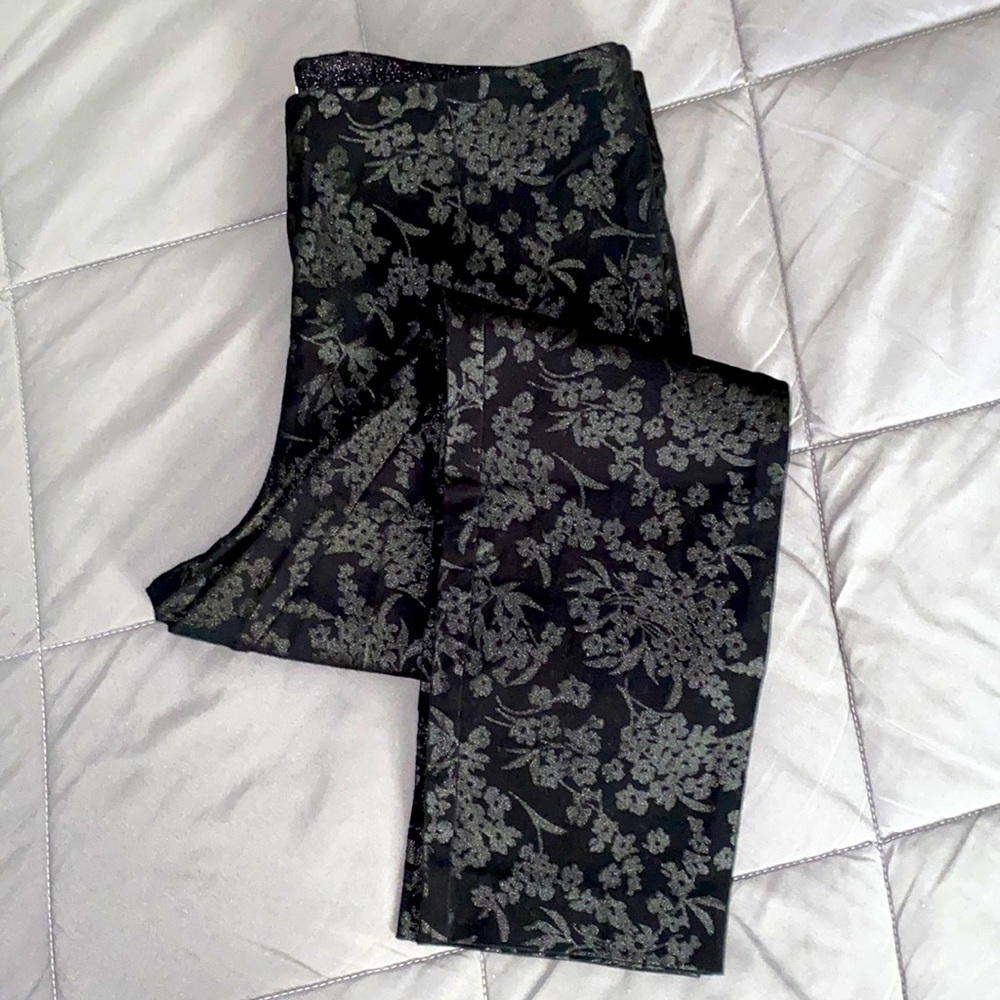 Black pants with floral “burnout” pattern